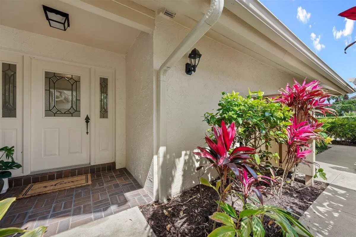 Welcoming Front Entry at 17138 Waterbend Drive 117, Jupiter
