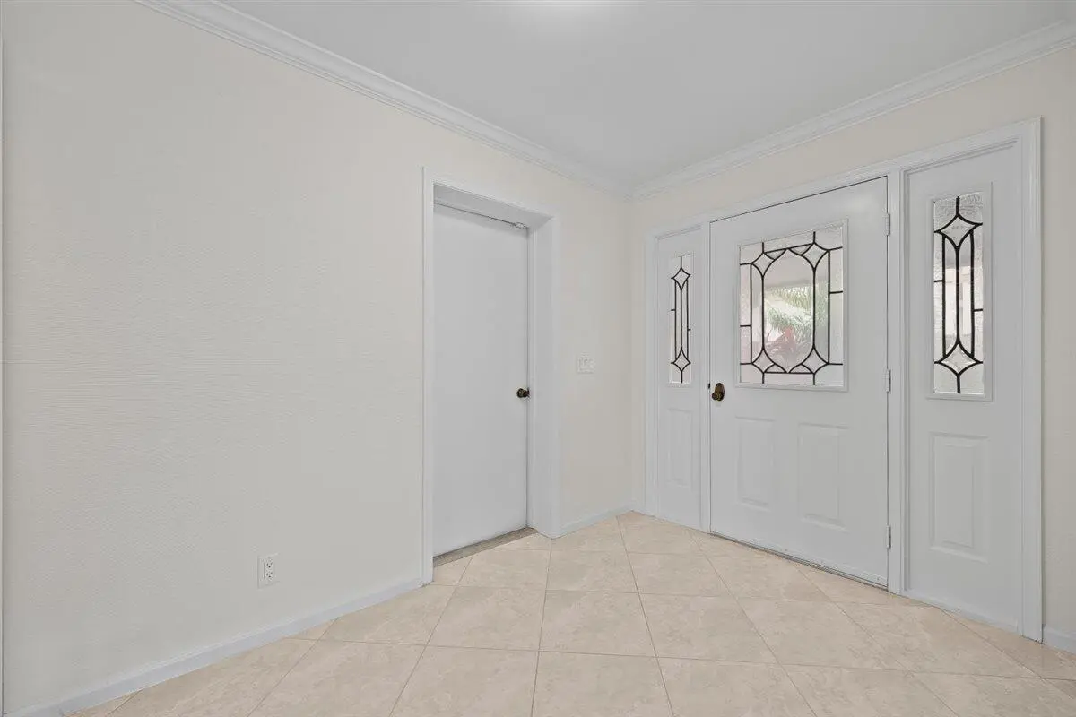 Welcome Foyer at 17138 Waterbend Drive 117, Jupiter