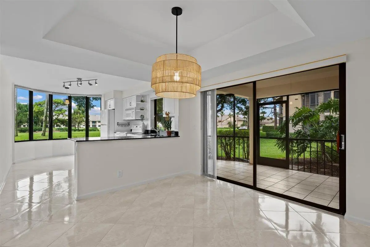 Dining Space with Natural Light at 17138 Waterbend Drive 117, Jupiter