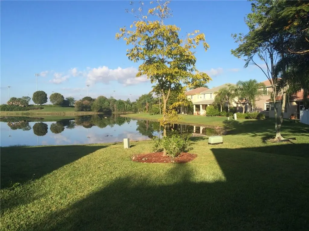 Photo 5 at 673 CONSERVATION Drive, Weston