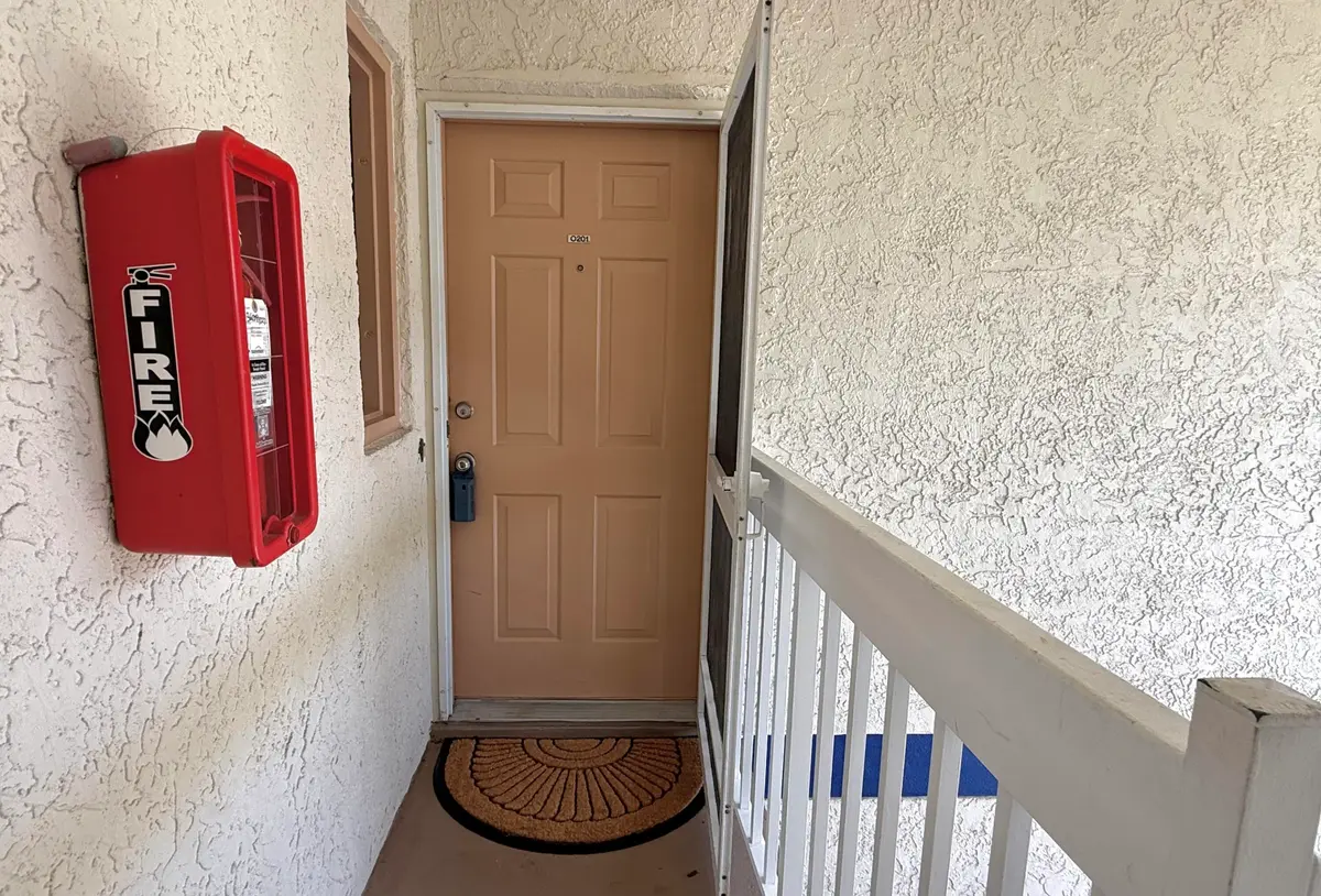 5 - Unit Front Door at 1532 SE Royal Green Cir O-201, Port St. Lucie