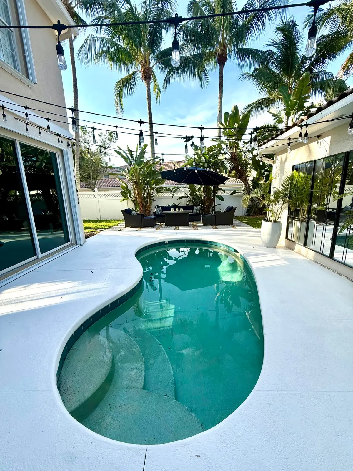 Private Pool open to extended patio at 4122 Parkside Drive, Jupiter
