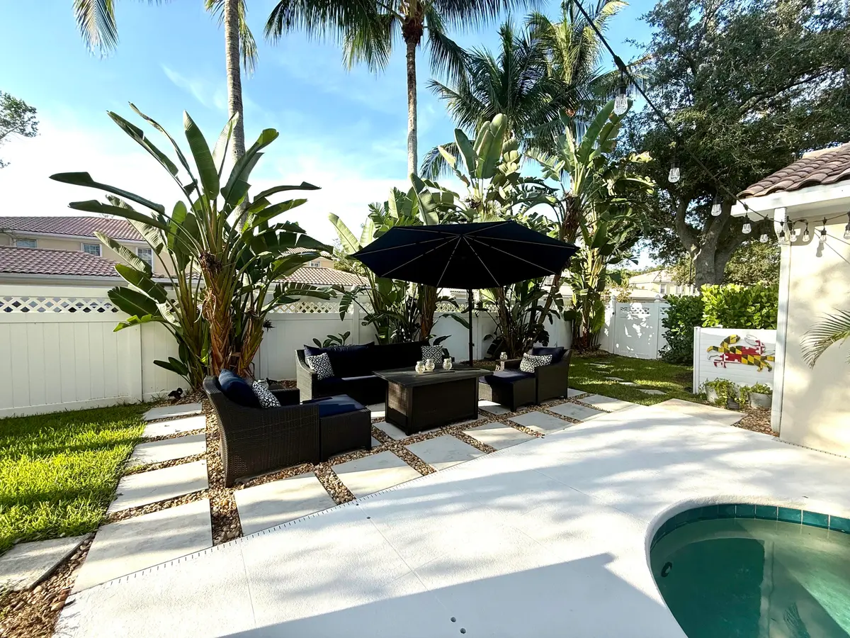 Private Pool open to extended patio at 4122 Parkside Drive, Jupiter
