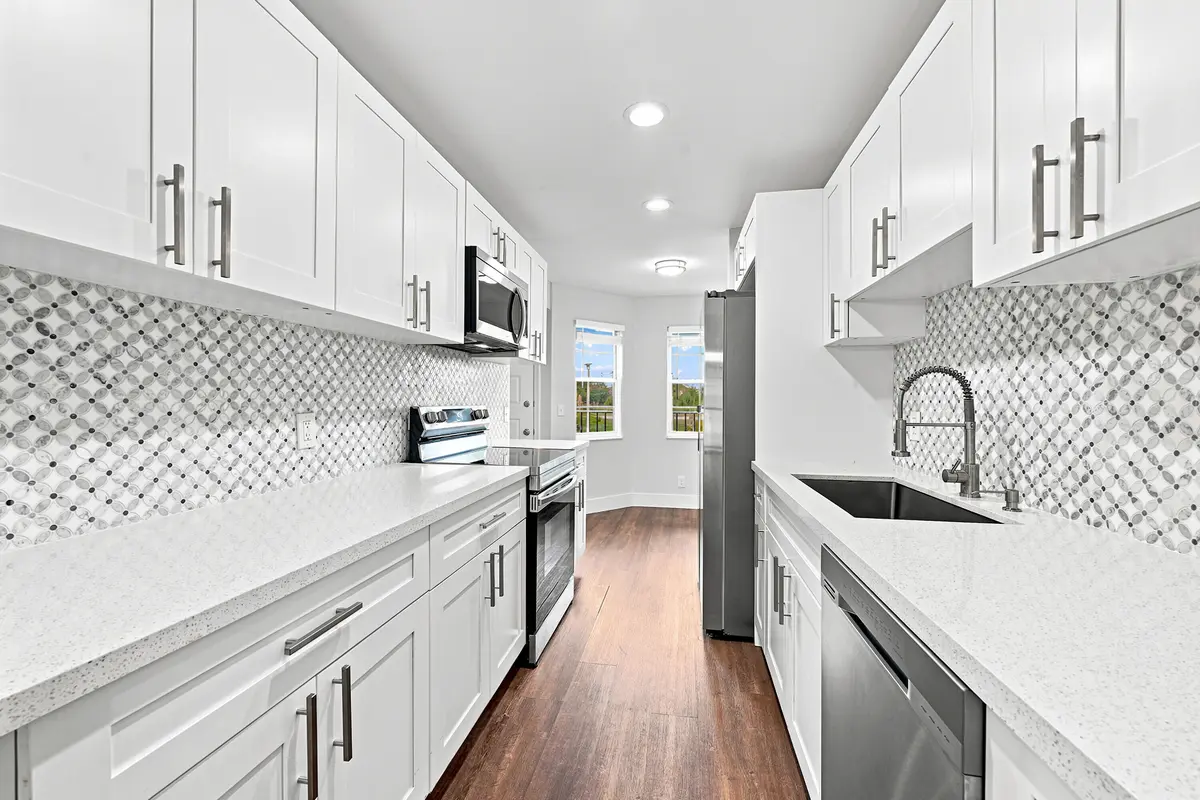 Kitchen & Breakfast Nook w/Water Views at 1400 SW 124th Terrace 202Q, Pembroke Pines