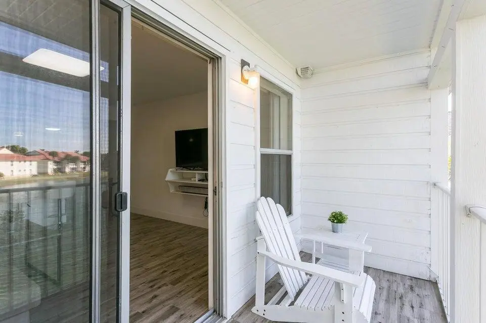 Balcony & Living Area at 275 Cypress Point Drive, Palm Beach Gardens