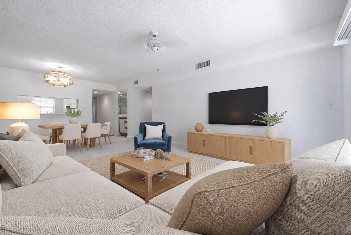 VIRTUAL STAGED LIVING ROOM at 1141 Keystone Drive C, Jupiter