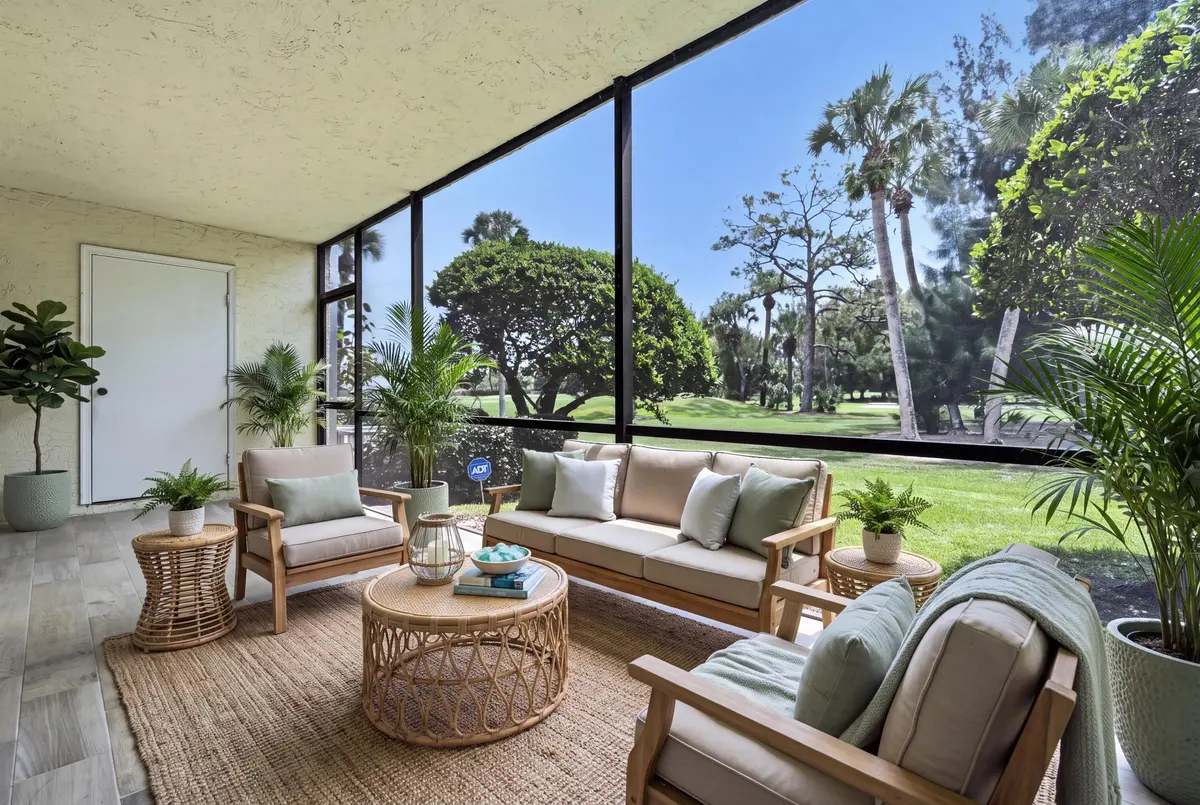VIRTUAL STAGED LANAI WITH VIEW at 1141 Keystone Drive C, Jupiter