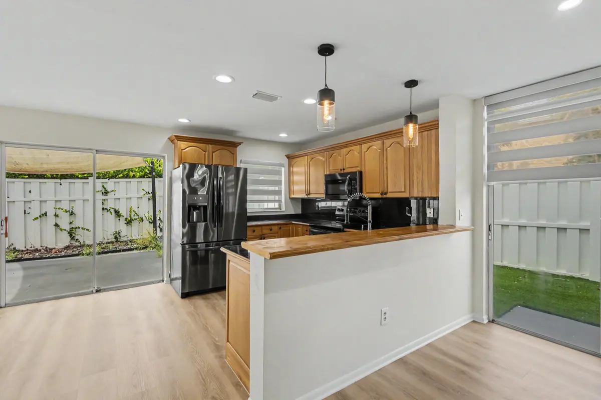 Kitchen and view to backyard at 9825 NW 2nd Court, Plantation