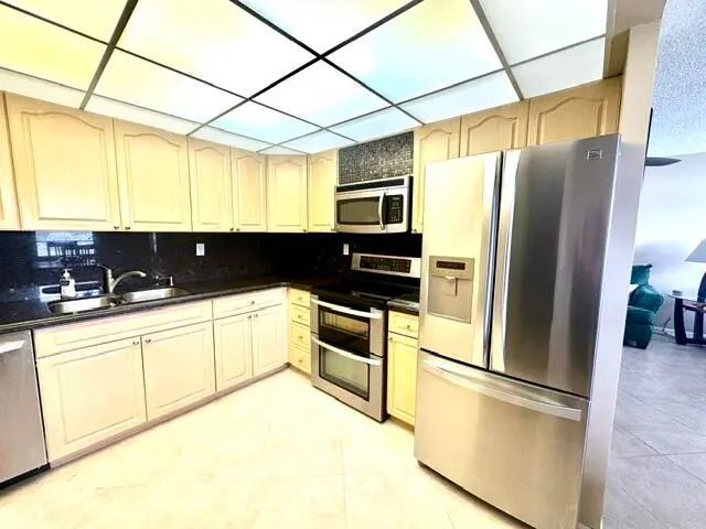 Updated Kitchen w/ Lots of Cabinets at 1049 Lincoln C, Boca Raton