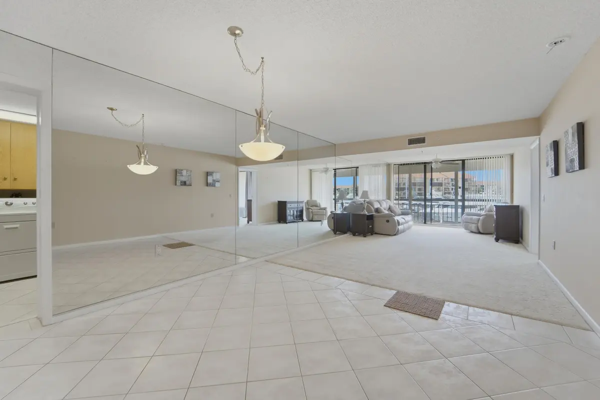 Dining-Living at 2601 MARINA ISLE Way 204, Jupiter