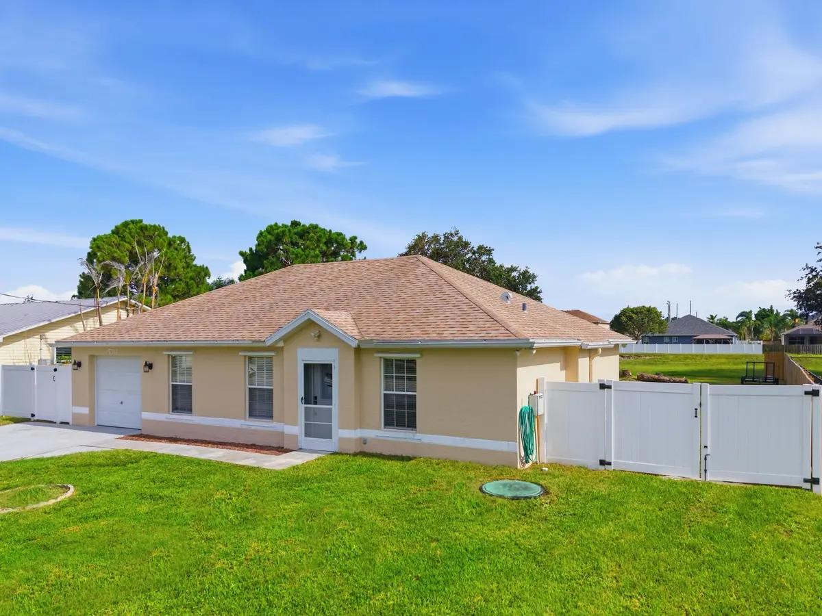 Front 2 at 5807 NW BURRI Court, Port St. Lucie