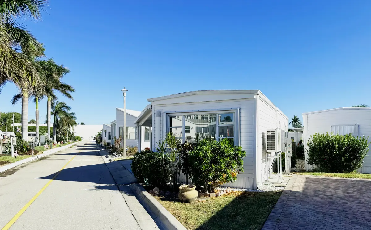 exterior facing east at 208 Flamingo Drive, Briny Breezes
