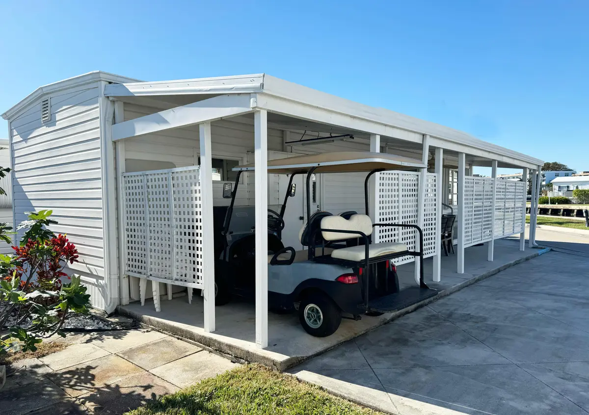 covered patio at 208 Flamingo Drive, Briny Breezes