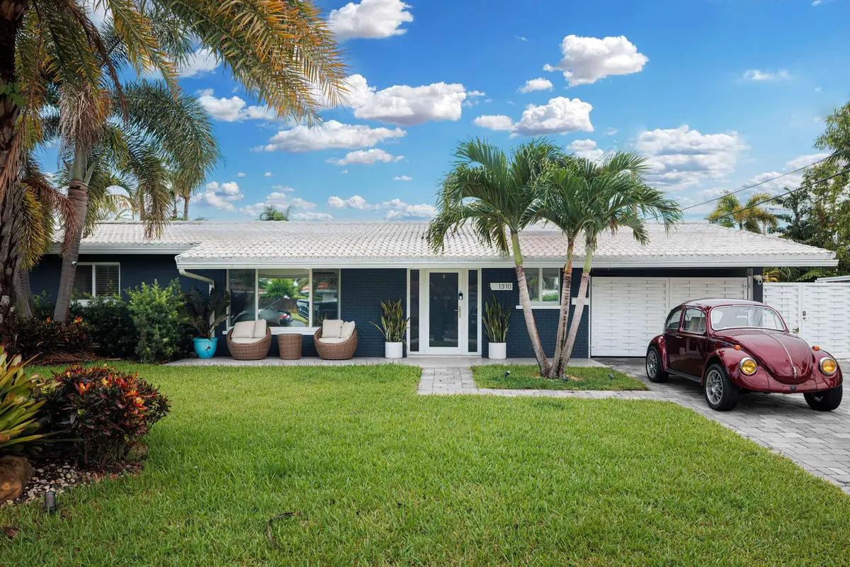 1310 ne 46th st Oakland Frotn Yard by Pw at 1310 NE 46TH Street, Oakland Park