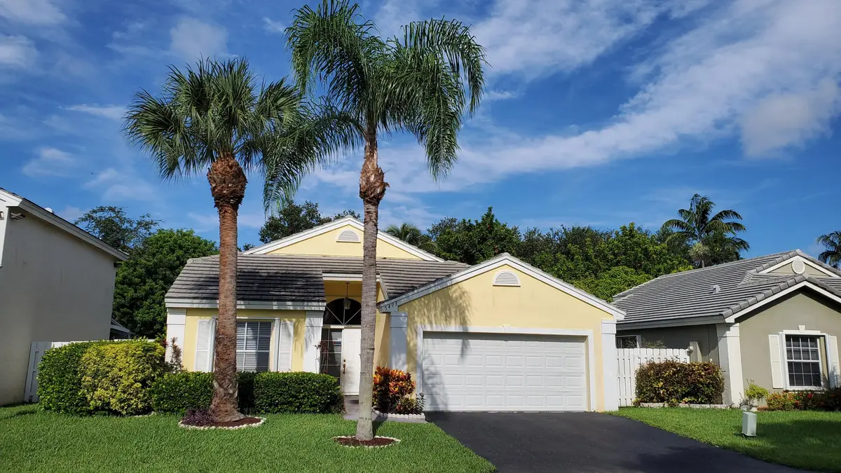 Front (2) at 5403 NW 55th Terrace, Coconut Creek