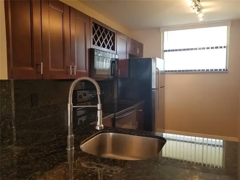 Photo 5 at 110 Lake Emerald Drive 409, Oakland Park