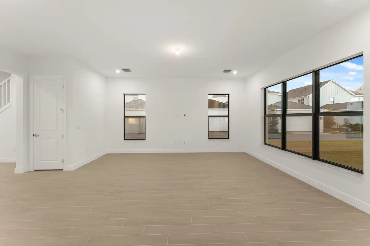 US_SEF_BALLADE_LOT 208_GREAT ROOM at 691 SW Backus Lane, Palm City