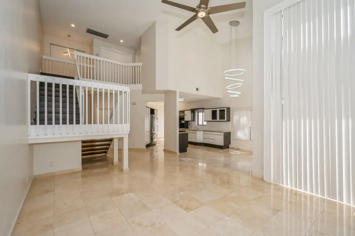 08_5504FoxHollowDr_93_LivingRoomDiningRo at 5504 FOX HOLLOW Drive, Boca Raton