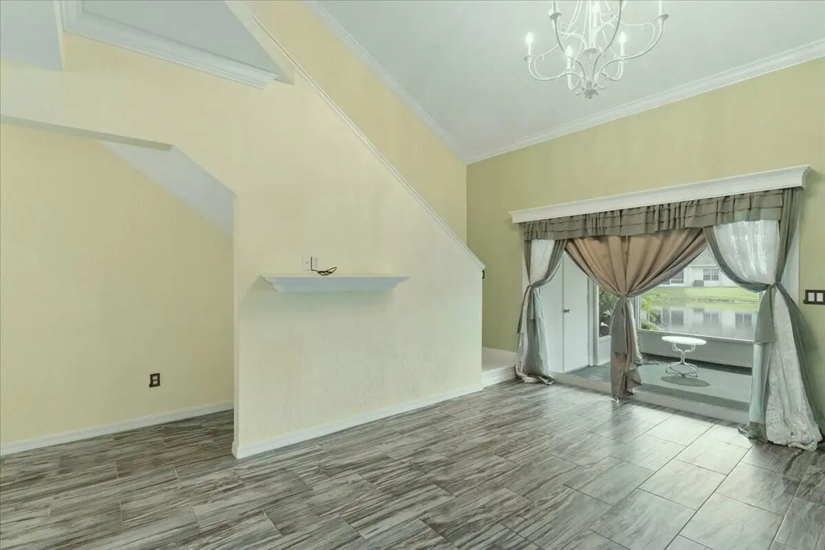 Living Room to Porch & Lake at 1820 Waterford Drive, Vero Beach