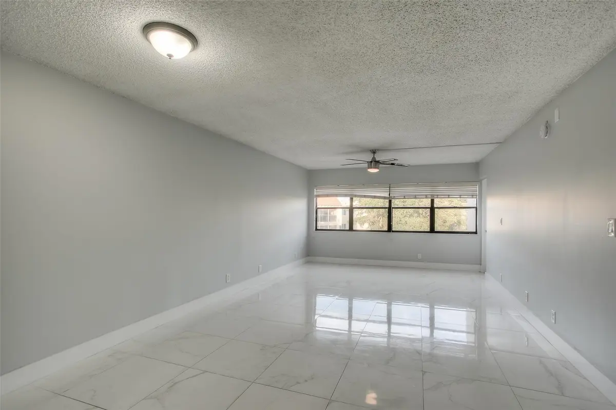 Photo 4 at 303 RACQUET CLUB Road 312, Weston