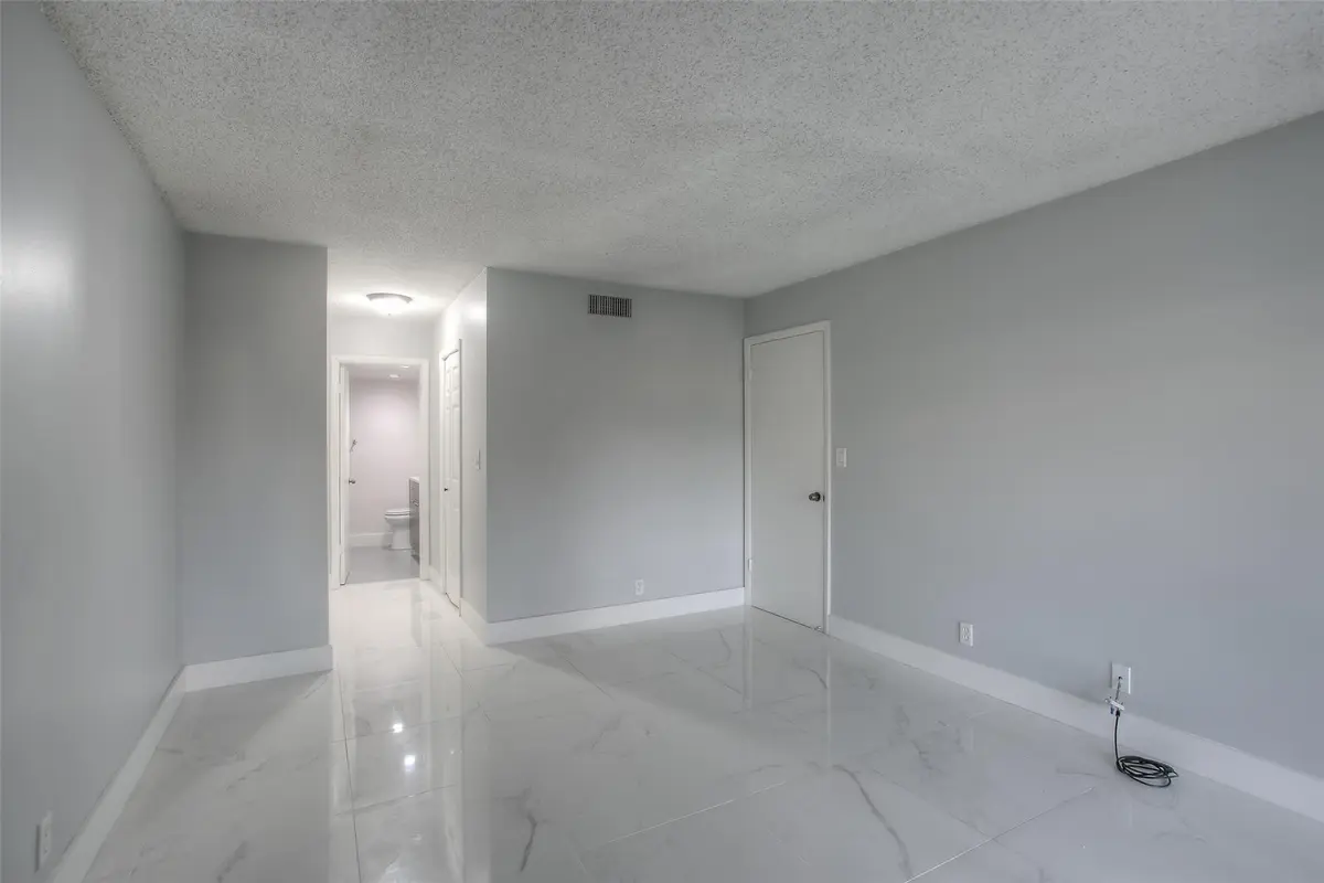 Photo 5 at 303 RACQUET CLUB Road 312, Weston