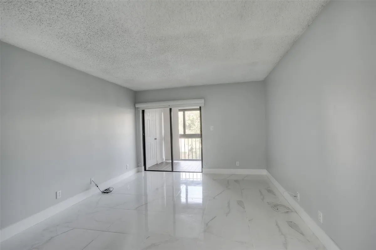 Photo 7 at 303 RACQUET CLUB Road 312, Weston