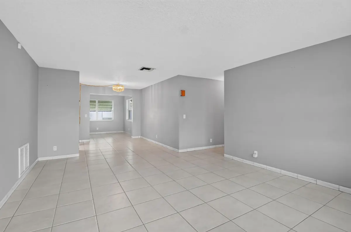 Living room, dining/ tile floor at 2091 SW 13th Terrace, Boynton Beach