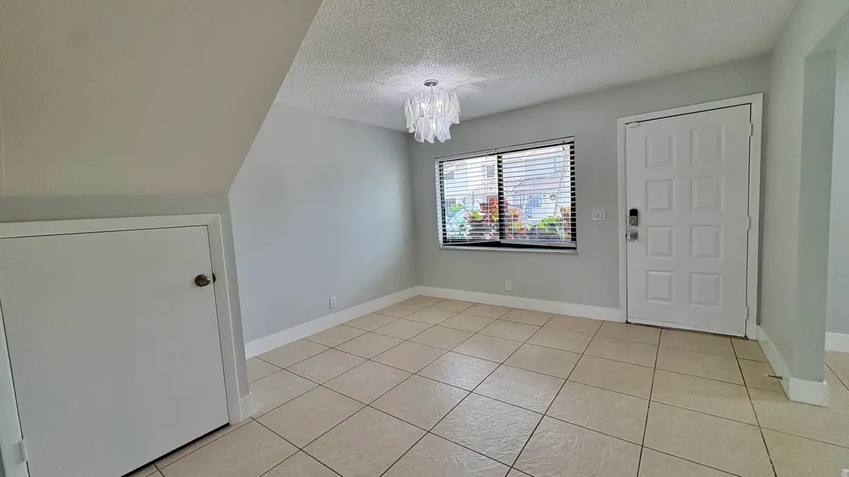 DINING ROOM AND ENTRANCE at 5325 TENNIS Lane, Delray Beach