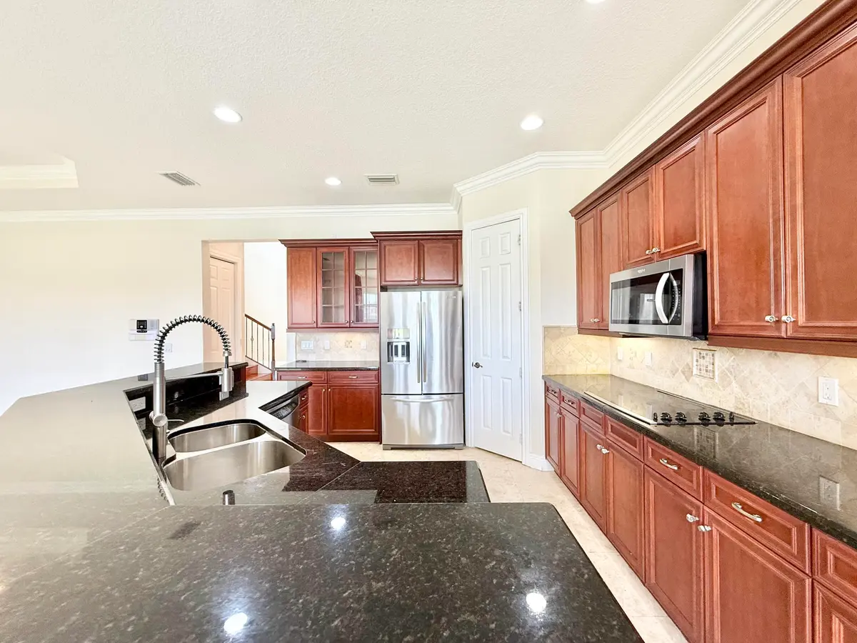 SPACIOUS GRANITE KITCHEN at 9656 Cobblestone Creek Drive, Boynton Beach