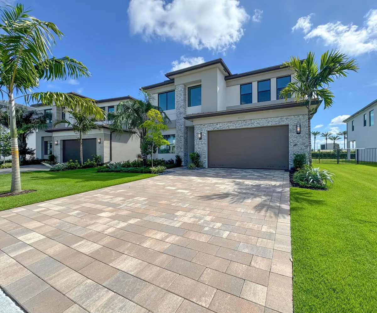 Exterior with long driveway at 9377 Sunflower Meadow Road, Boca Raton