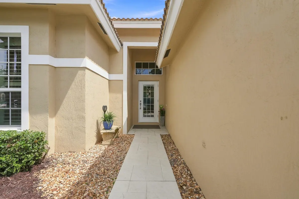 04_exterior entry at 4870 SE Devenwood Way, Stuart