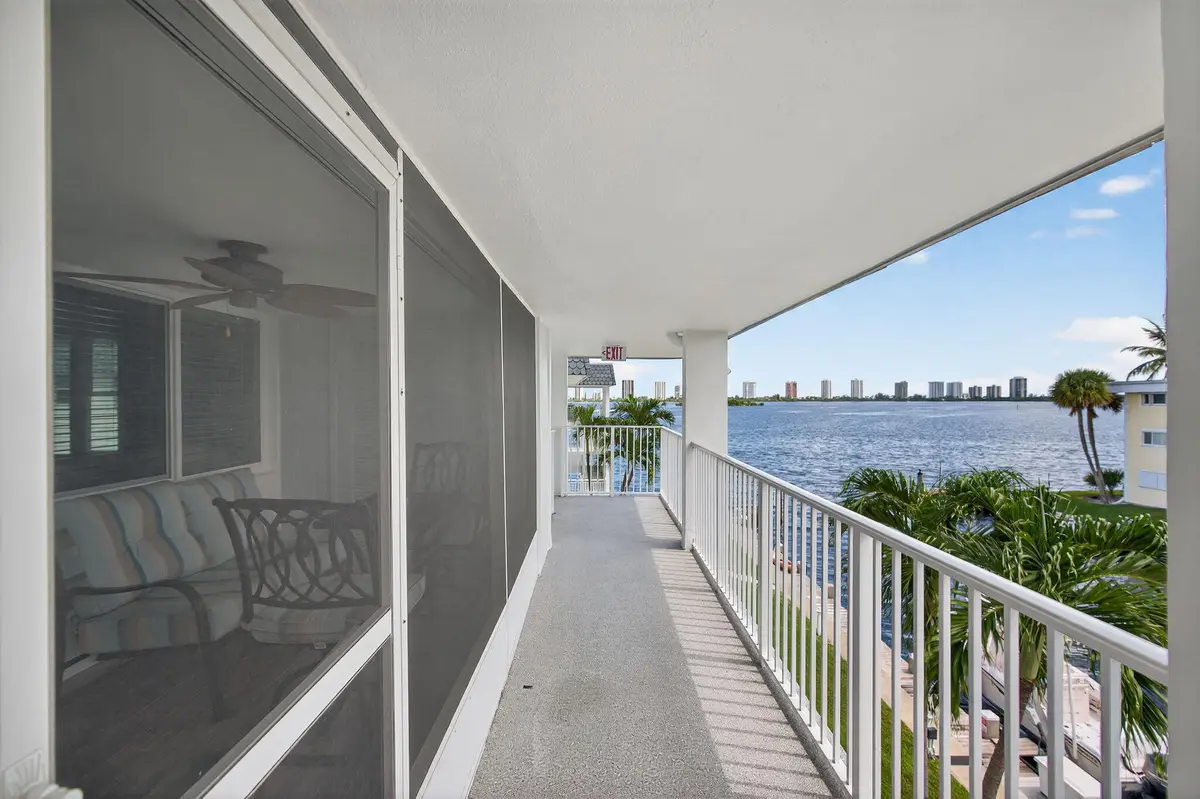 walkway to lanai at 110 SHORE Court 301, North Palm Beach