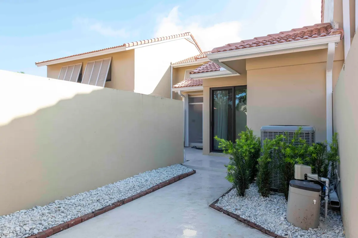 Main entrance at 257 OLD MEADOW Way, Palm Beach Gardens