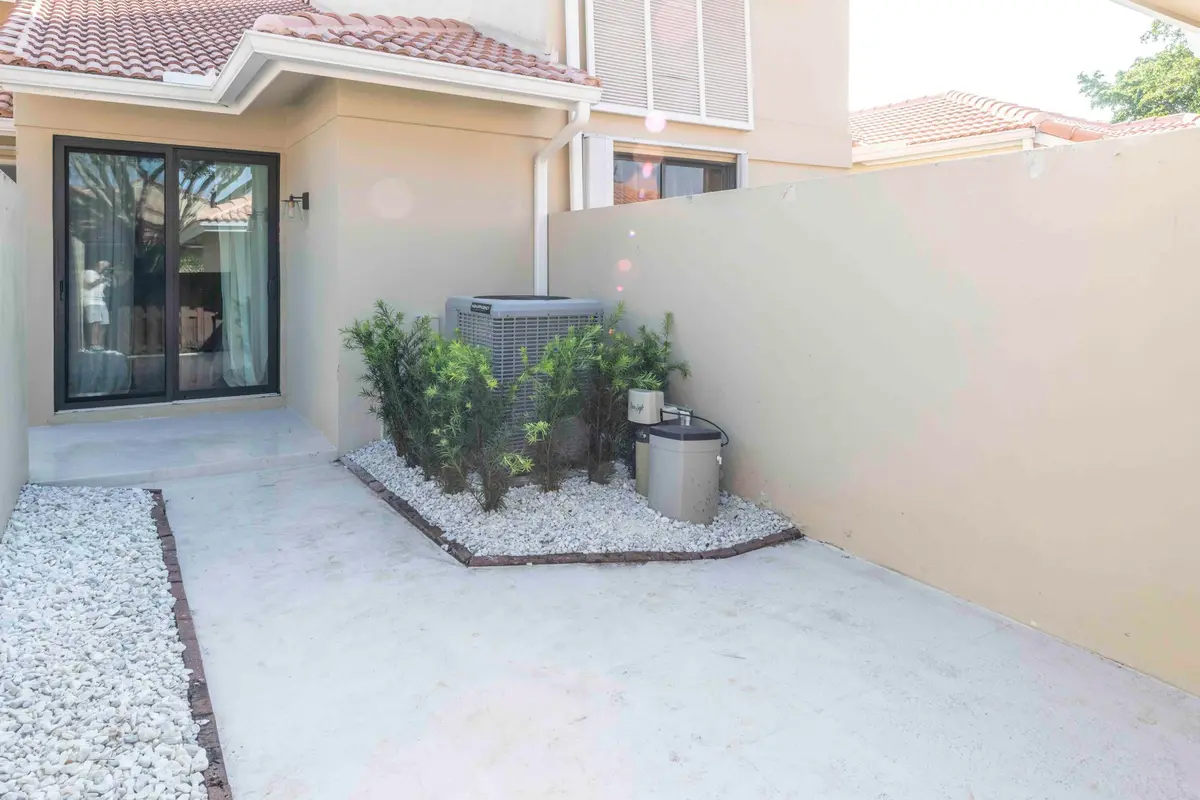 Main entrance at 257 OLD MEADOW Way, Palm Beach Gardens