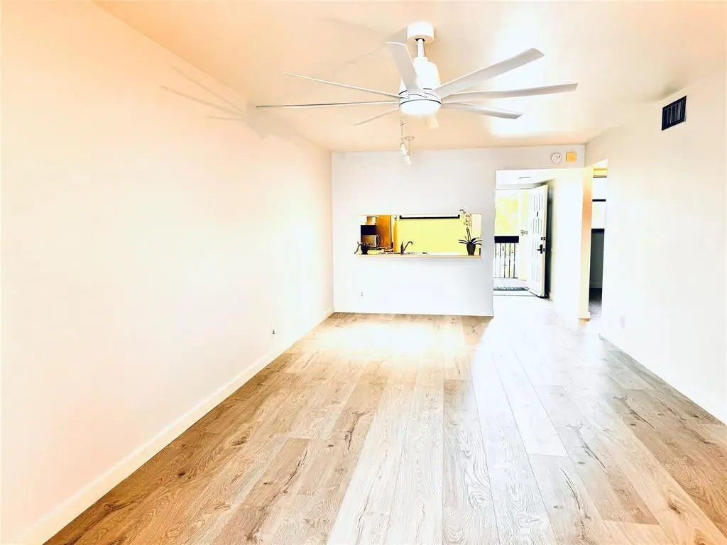 Living Room/Dining Room at 111 LAKE EMERALD Drive 407, Oakland Park