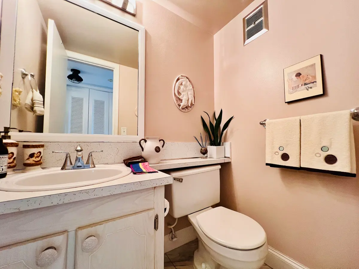 Half Bath at 437 Chatham U, West Palm Beach