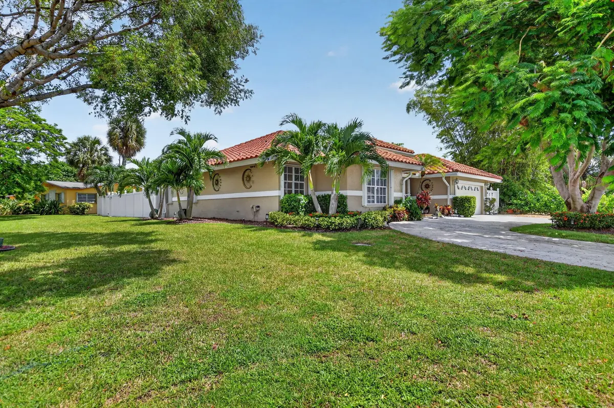 Corner unit at 703 AVOCET Road, Delray Beach