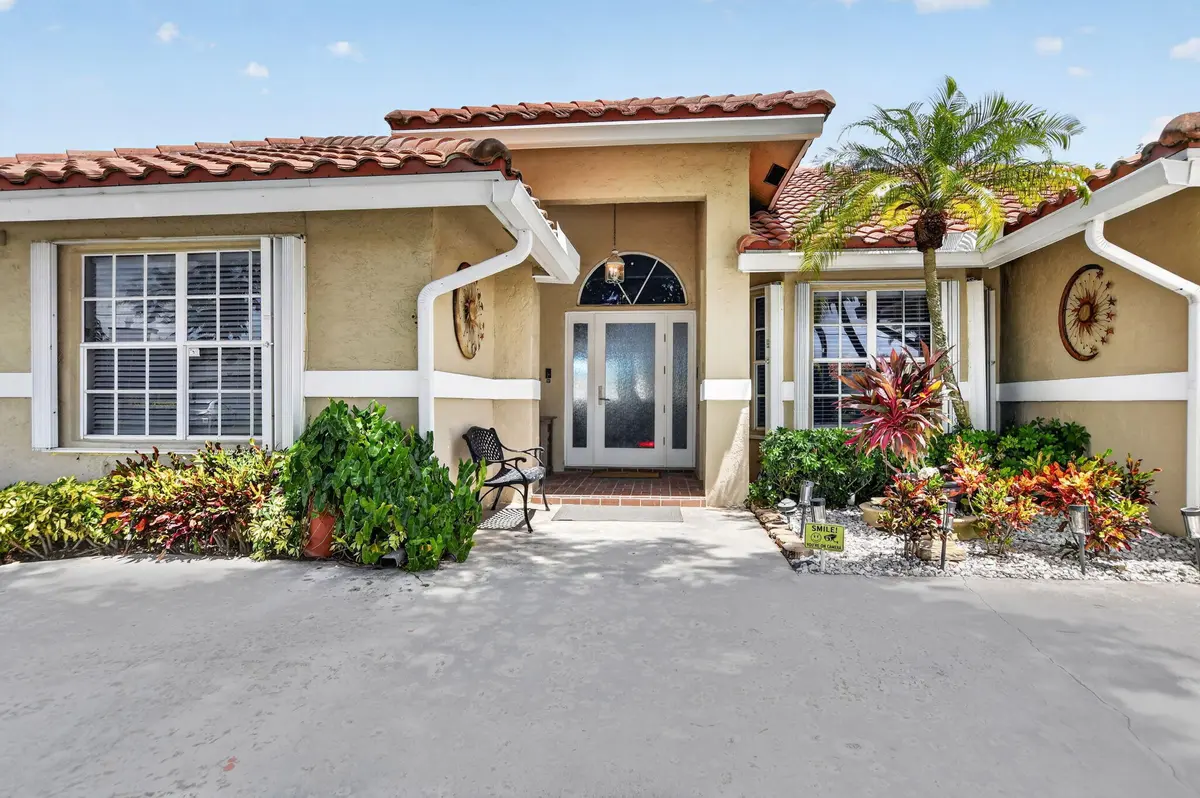 Entrance at 703 AVOCET Road, Delray Beach