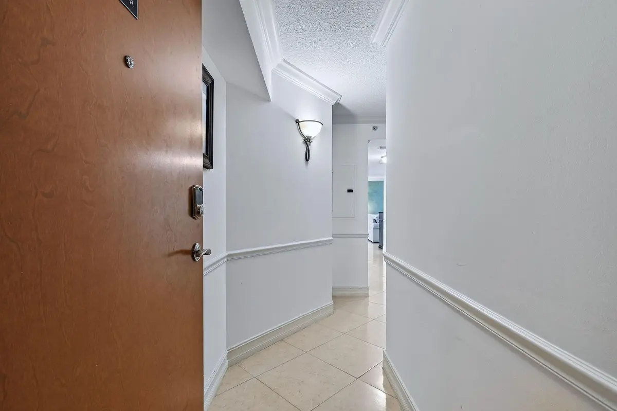 Open the door to Residence 8A at 3000 N OCEAN Drive 8A, Singer Island