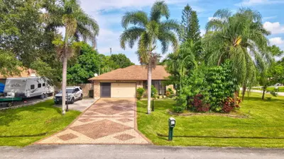 501 NW COLONIAL Street, Port St. Lucie – Single Family Residence for sale
