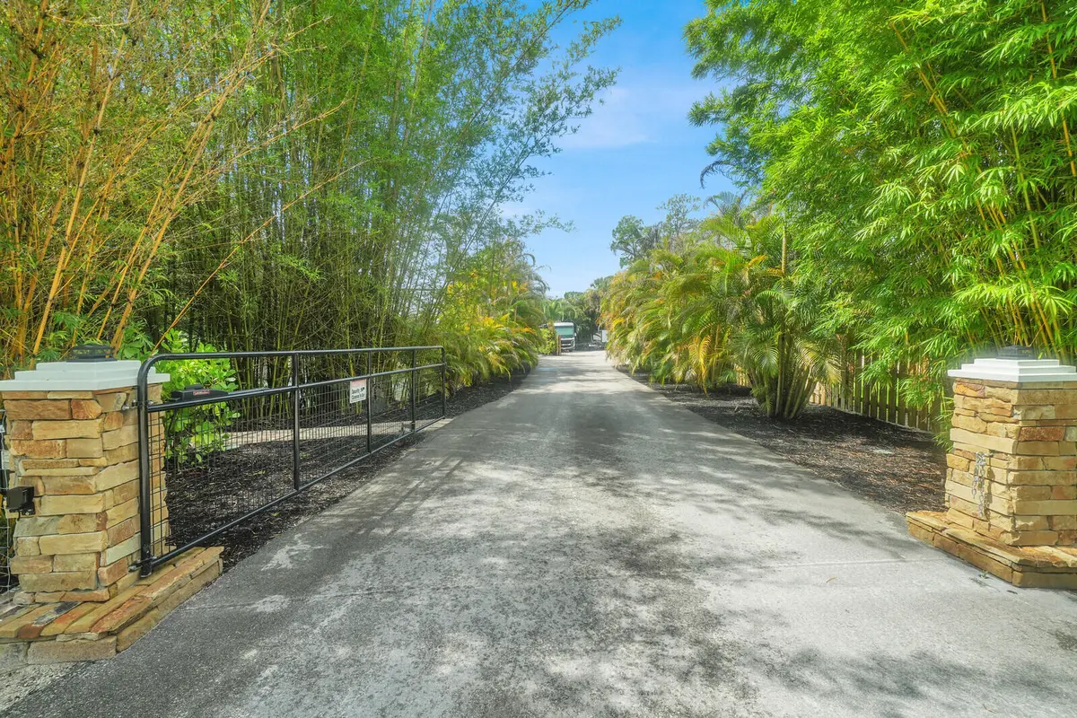 Front electric gate at 13432 153RD Road, Jupiter Farms