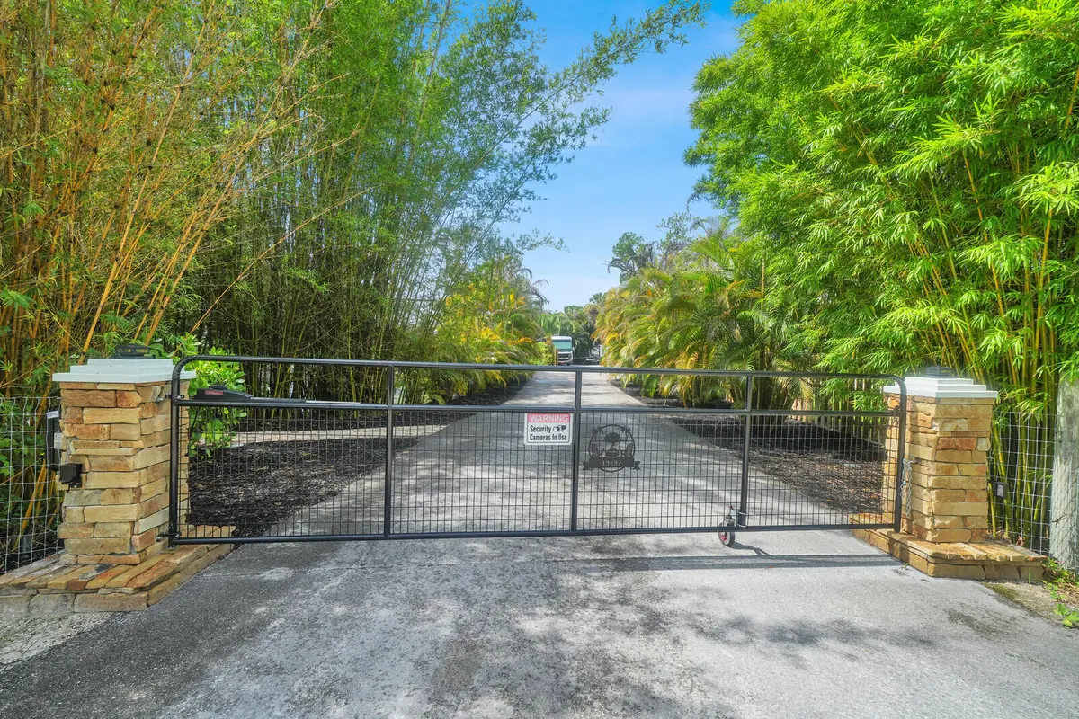 Front electric gate at 13432 153RD Road, Jupiter Farms