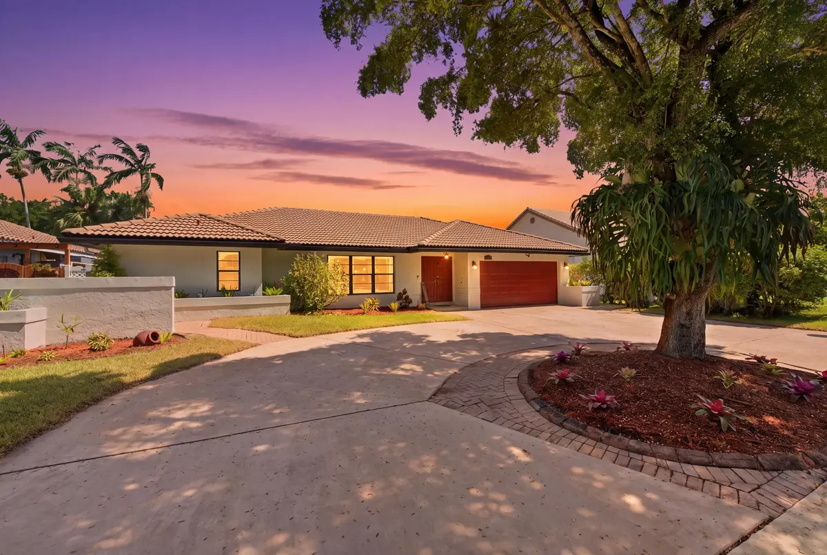 1_001__dsc7192_twilight_4a2fc651 at 6013 NW 47th Place, Coral Springs