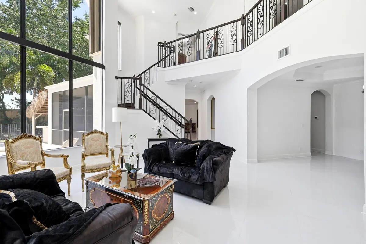 Living Rooom, staircase at 10594 Versailles Boulevard, Wellington