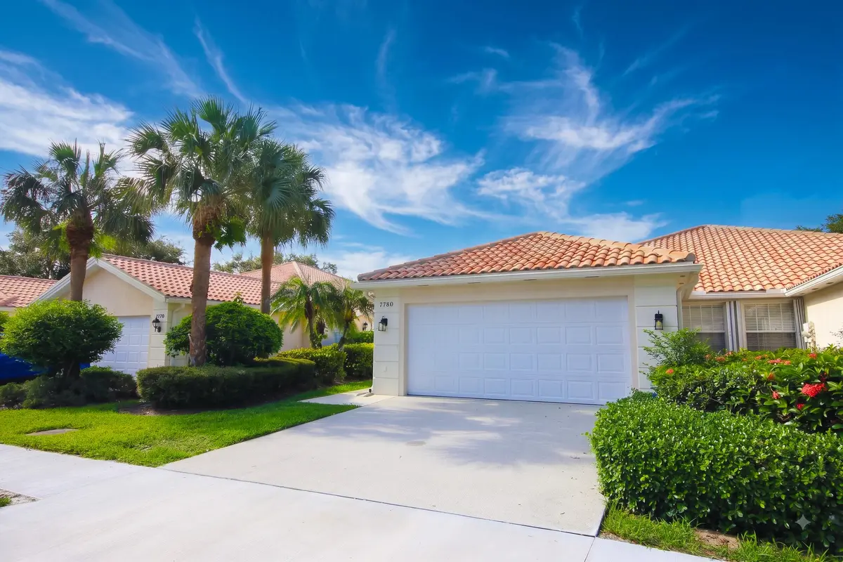 ext_front_34_day_alt at 7780 Pine Island Way, West Palm Beach