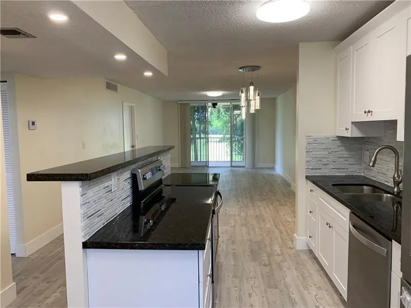 Photo 1 at 250 JACARANDA Drive 203, Plantation