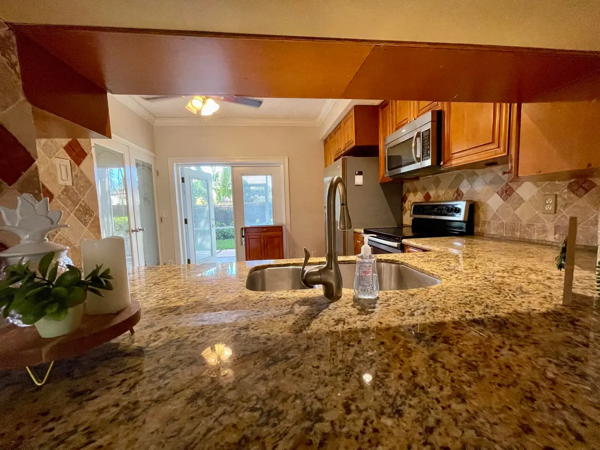 Kitchen pass through at 926 Kokomo Key Lane 926, Delray Beach