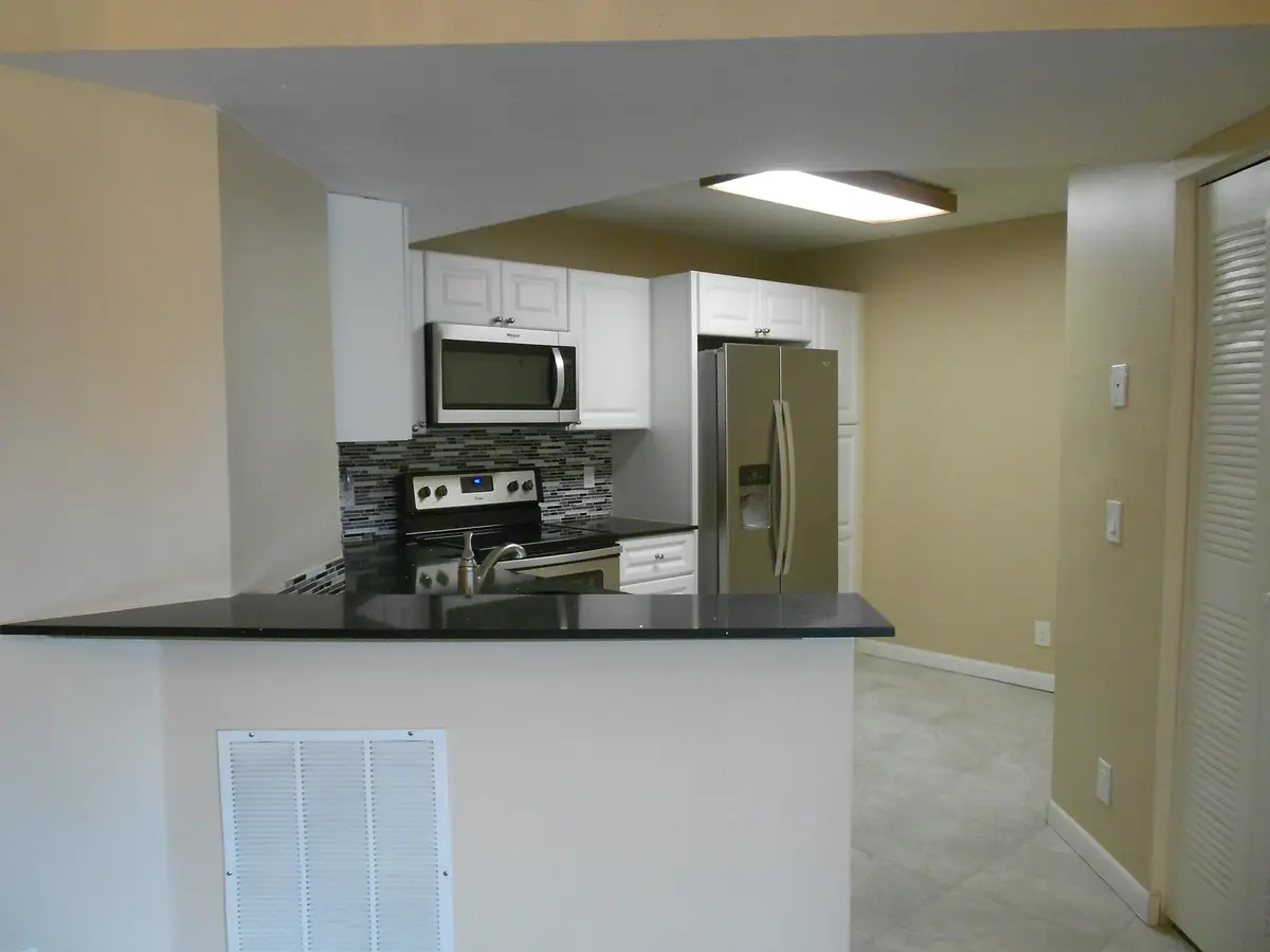Kitchen at 8977 Wiles Road 203, Coral Springs