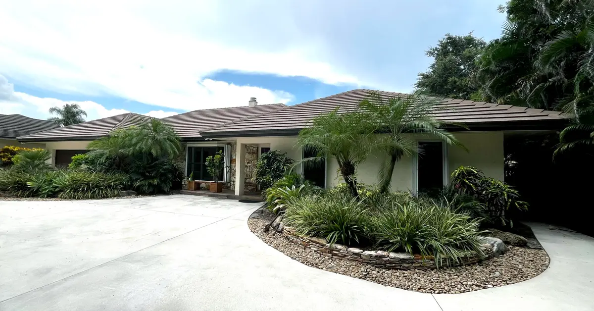 Front Exterior 2 at 5125 WOODLAND LAKES Drive, Palm Beach Gardens