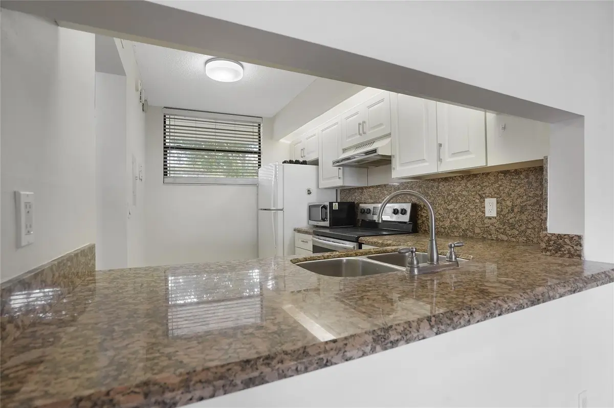Photo 4 at 109 Lake Emerald Drive 110, Oakland Park